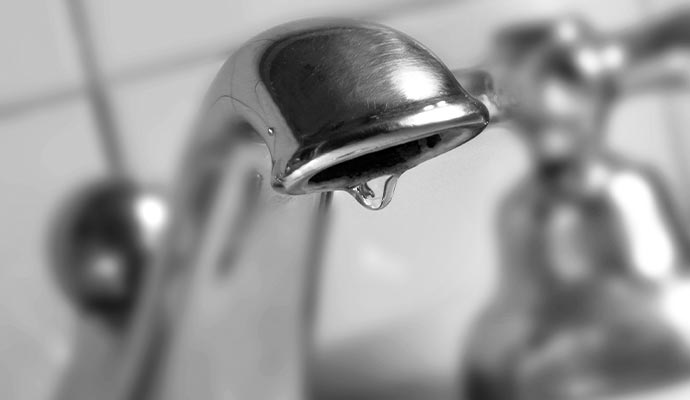 leaky faucet droping water