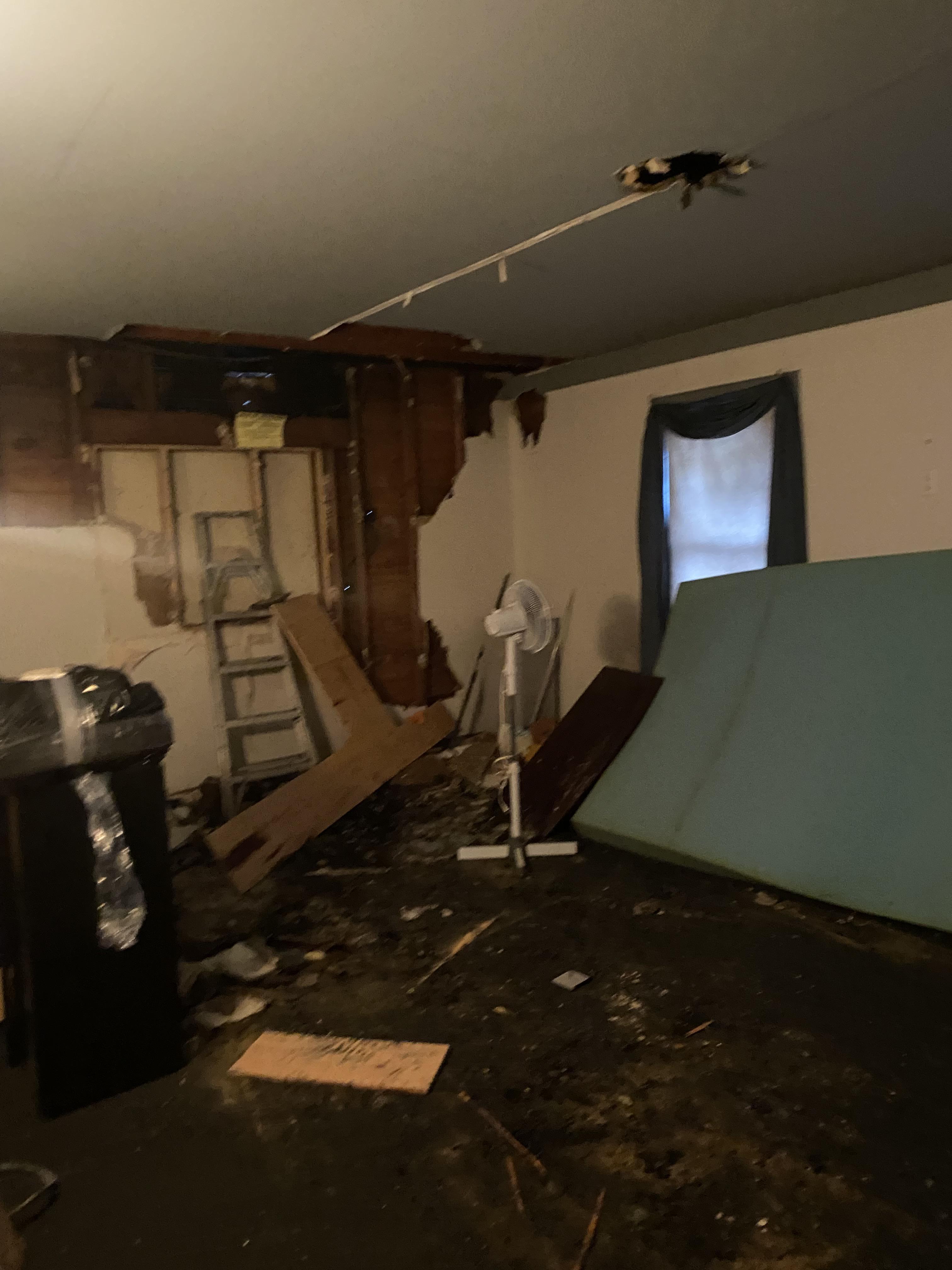 Fire and water damage in bedroom
